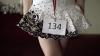 Irish dancer in a dress with '134' badge 