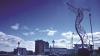Beacon of Hope statue in Belfast - metal sculpture of a woman facing the city