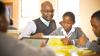 Teacher with pupil