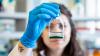 Scientist with algae sample