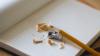 Pencil and sharpener on notepad 