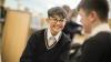 smiling boy in school uniform