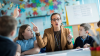 Teacher teaching primary class