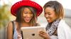 Two women with an iPad