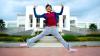 Aspirational jump in front of the University of Nottingham in Malaysia. Photo (c) University of Nottingham, licensed under CC BY-NC-SA 2.0 and adapted from the original.