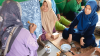 A group of people engaged in activities.