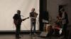 band of four playing instruments