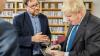 Image of the Foreign Secretary looking at the ‘Crossing Points: UK-Poland' publication