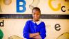 Young Kenya girl in school setting.