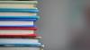 Stack of books with multicoloured covers