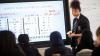 School children learning arabic language in a classroom