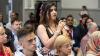 A young woman asking questions in a forum