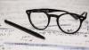 Photo of glasses on script