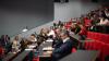A room full of people at a conference