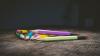 Multicoloured pencils on a wooden surface 