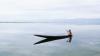 Young Bangladeshi man in boat