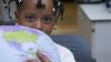 British Council Schools child with globe