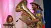 artist playing tuba 