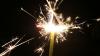 Hand sparkler at night