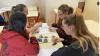 Four students work together with photos of Yorkshire
