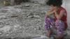 Syrian girl reads her book