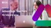 man and woman looking at laptop