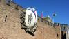 Art installation of Welsh rugby ball in a wall
