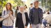 Photo of young people walking through a city