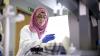 A female scientist conducting an experiment