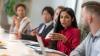 A group of people in a meeting.
