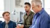 Businessman discussing strategy with coworkers