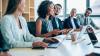 A group of people in a meeting.