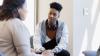Counsellor talks to young man 