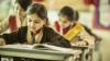 A young girl studies in a classroom in Pakistan