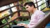 man sitting with laptop