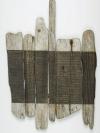 Six pieces of flat rough wood, that have neat thin lines across the middle.