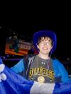 Man holding a Quebec flag celebrating Quebec international festival. 