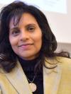 Rajani Naidoo smiling at the camera