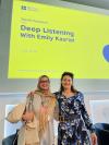 Tiba Khalifa and Emily Kasriel, standing in front of a British Council branded video screen which says: Youth Connect. Deep listening with Emily Kasriel. 2 July 2024.