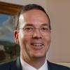 A headshot of Scott McDonald, CEO of the British Council